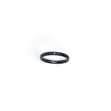Rare Earth Gallery 2mm titanium ring with black IP plating and a half-band of sparkling black cubic zirconia stones.