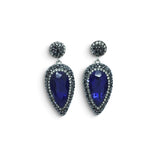 Rare Earth Gallery blue sapphire dangle earrings with faceted reverse pear stones, marcasite, and silver crystals.