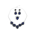 Rare Earth Gallery blue sapphire pear-shaped necklace, earring, and double band ring set with marcasite and silver.