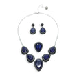 Rare Earth Gallery blue sapphire jewelry set with pear-cut stones, marcasite, and silver crystals on a white background