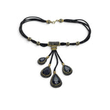 Rare Earth Gallery blue sapphire necklace with four faceted pear pendants, gold Swarovski crystals, and marcasite.