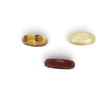 Rare Earth Gallery carnelian rings in banded orange, deep red, and translucent cream stone band styles.