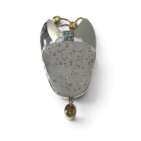 Rare Earth Gallery pendant featuring a natural druze stone, blue topaz, yellow sapphire, and 18k gold wire accents.