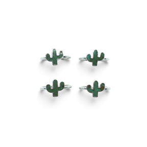Rare Earth Gallery sterling silver rings featuring green turquoise cactus-shaped bezel settings on a white background