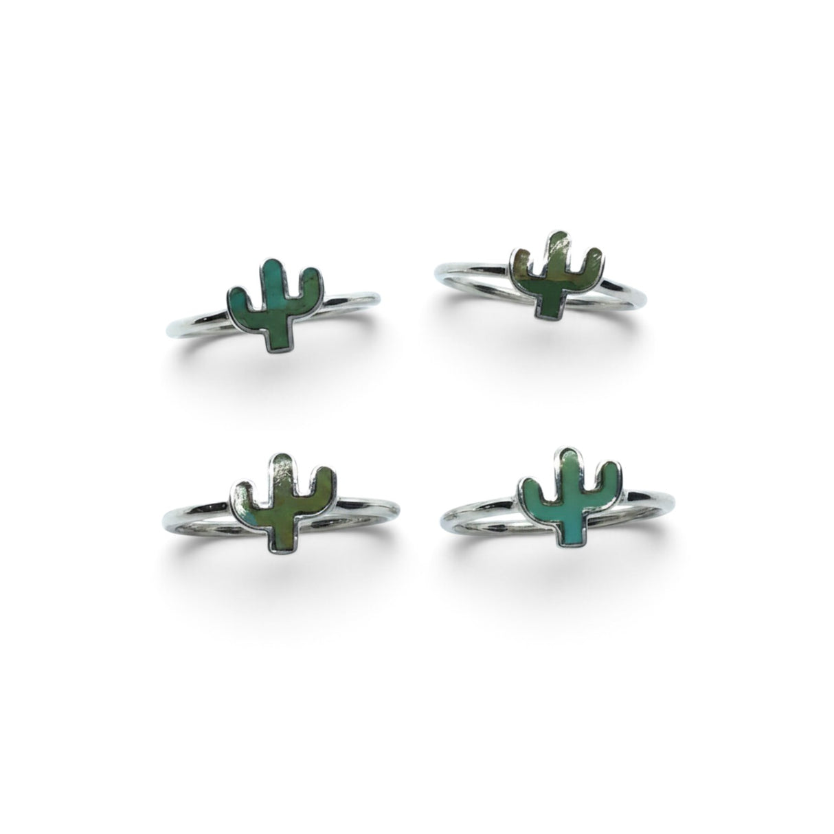 Rare Earth Gallery sterling silver rings featuring green turquoise cactus-shaped bezel settings