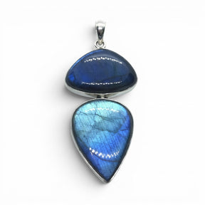 Rare Earth Gallery labradorite pendant featuring a triangle and pear cabochon in blue and teal set in sterling silver.