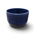 Rare Earth Gallery 10-inch lapis lazuli gem infused quartz singing bowl in deep blue, tuned to note A at 440 Hertz.