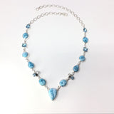 Rare Earth Gallery Larimar link necklace with faceted blue topaz and pearl accents, featuring a pear-shaped larimar pendant.