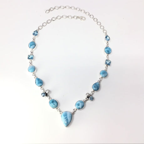 Rare Earth Gallery Larimar link necklace with faceted blue topaz and pearl accents, featuring a pear-shaped larimar pendant.