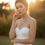 Rare Earth Gallery Larimar link necklace with faceted blue topaz and pearl accents on a bride.