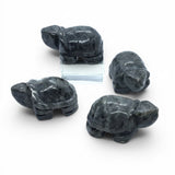 Rare Earth Gallery handcrafted larvikite turtle carvings with silvery-gray shimmer and natural stone striations