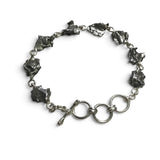 Rare Earth Gallery Campo De Cielo meteorite link bracelet featuring eight raw iron freeform stones and a toggle clasp.
