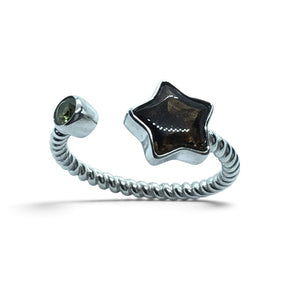 Rare Earth Gallery star-shaped Sericho pallasite meteorite and green moldavite ring on a sterling silver rope band.