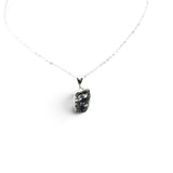 Rare Earth Gallery Campo De Cielo meteorite nugget pendant in a 925 sterling silver bezel on an 18-inch chain