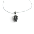 Rare Earth Gallery Campo De Cielo meteorite nugget pendant in a 925 sterling silver bezel on an 18-inch chain