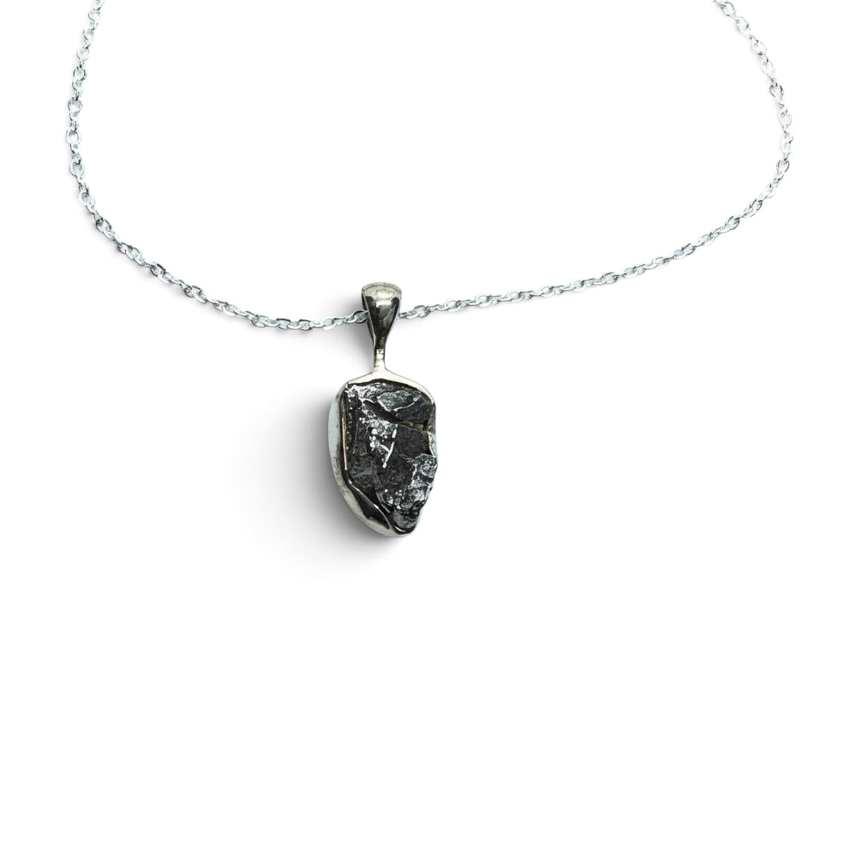 Rare Earth Gallery Campo De Cielo meteorite nugget pendant in a 925 sterling silver bezel on an 18-inch chain