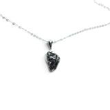 Rare Earth Gallery Campo De Cielo meteorite nugget pendant in a 925 sterling silver bezel on an 18-inch chain