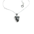 Rare Earth Gallery Campo De Cielo meteorite nugget pendant in a 925 sterling silver bezel on an 18-inch chain