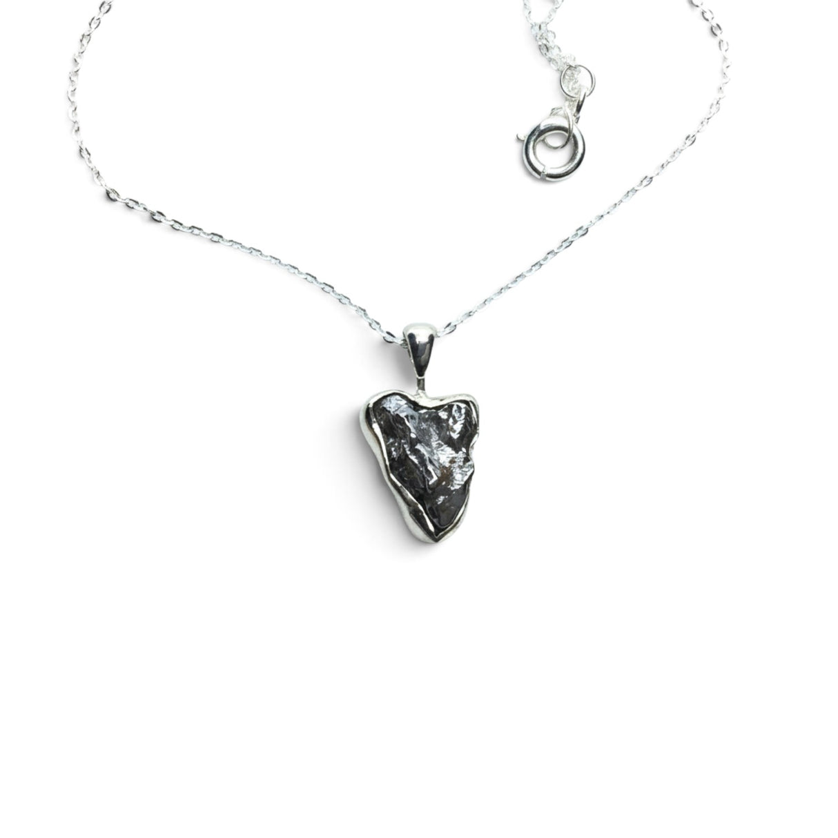 Rare Earth Gallery Campo De Cielo meteorite nugget pendant in a 925 sterling silver bezel on an 18-inch chain