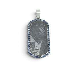 Rare Earth Gallery rounded rectangle Muonionalusta meteorite pendant in a 925 sterling silver bezel with blue sapphires