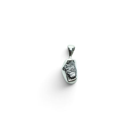 Rare Earth Gallery Campo De Cielo meteorite pendant featuring an organic nugget shape in a 925 sterling silver bezel