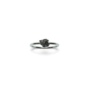 Rare Earth Gallery Campo De Cielo meteorite nugget ring prong-set on a simple polished silver band