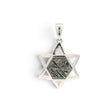 Rare Earth Gallery Muonionalusta meteorite hexagon slice set in a sterling silver Star of David pendant.