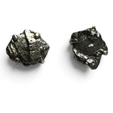 Rare Earth Gallery Campo De Cielo meteorite stud earrings featuring raw, dark metallic nuggets in prong settings.