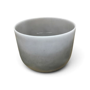 Rare Earth Gallery 10-inch obsidian gem-infused quartz singing bowl tuned to note F at 440 Hz for sound healing.