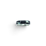 Rare Earth Gallery ring featuring black onyx and white opal inlay with silver channeling in a geometric design.