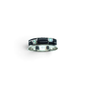 Rare Earth Gallery ring featuring black onyx and white opal rectangle cabochon inlay with silver channel detailing.