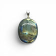 Rare Earth Gallery oval labradorite pendant with green, orange, and blue labradorescence in a silver setting.