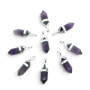 Rare Earth Gallery purple fluorite double point pendants in sterling silver open lantern bezels arranged in a circle