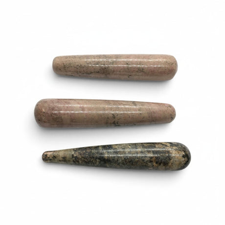 Rare Earth Gallery rhodonite massage wands featuring polished pink and grey natural stone textures.