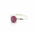 Rare Earth Gallery faceted ruby stalactite ring in a silver prong setting, size 11, isolated on a white background.
