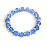 Rare Earth Gallery sapphire blue crystal beaded bracelet with sparkling silver-tone spacers on a white background