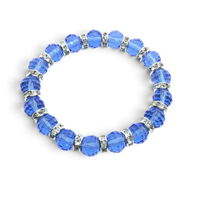 Rare Earth Gallery sapphire blue crystal beaded bracelet with sparkling silver-tone spacers on a white background