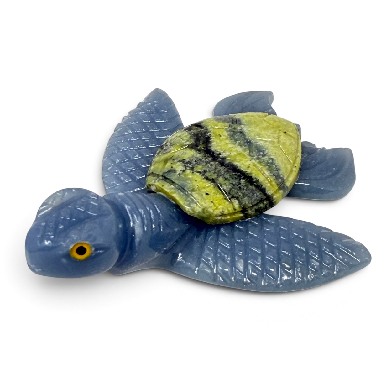 Rare Earth Gallery sea turtle carving crafted from blue angelite and green striped serpentine stone.