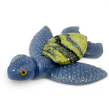 Rare Earth Gallery sea turtle carving crafted from blue angelite and green striped serpentine stone.