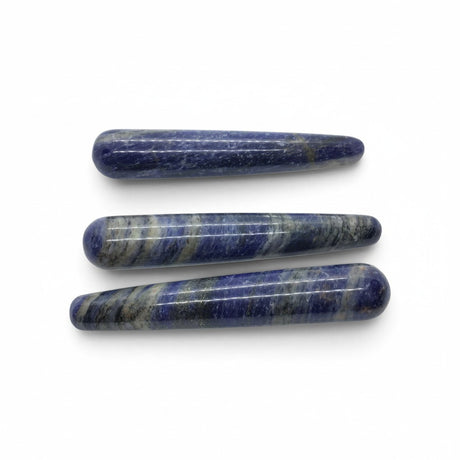 Three Rare Earth Gallery sodalite massage wands with smooth polished blue and white stone surfaces