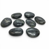 Rare Earth Gallery extra-small tumbled labradorite palm stones with subtle blue and green iridescent flashes.