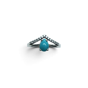 Rare Earth Gallery turquoise pear cabochon ring with white CZ chevron accents on a 925 sterling silver band