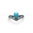 Rare Earth Gallery turquoise pear cabochon ring with white CZ chevron accents on a 925 sterling silver band