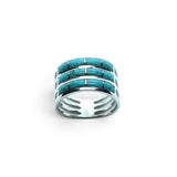 Rare Earth Gallery turquoise inlay ring with three rows of rectangular stones set in 925 sterling silver bands.