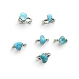 Rare Earth Gallery collection of polished freeform turquoise nugget rings set in simple 925 sterling silver bands.