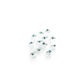 Rare Earth Gallery turquoise nugget dot rings with thin round bands displayed on clear acrylic stands