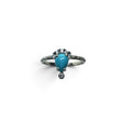 Rare Earth Gallery pear-shaped turquoise cabochon ring with white CZ accents on a stamped 925 sterling silver band