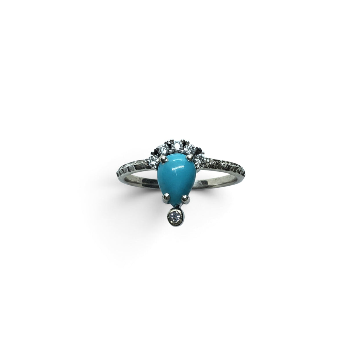 Rare Earth Gallery pear-shaped turquoise cabochon ring with white CZ accents on a stamped 925 sterling silver band