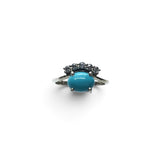 Rare Earth Gallery oval turquoise cabochon ring with white CZ accents set in 925 sterling silver