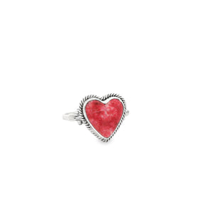 Thulite heart cabochon ring, pink-red stone framed by twisted rope bezel on sterling silver band